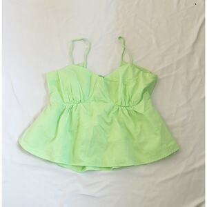 green sleeveless cotton blouse